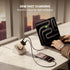 Person using a laptop with multiple devices charging on a desk, featuring 65W fast charging text.