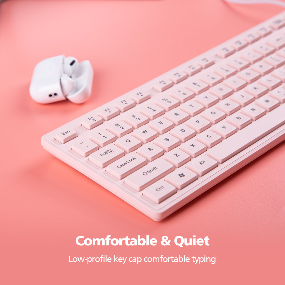 Pink keyboard and white earbuds on a pink background with text 'Comfortable & Quiet'.
