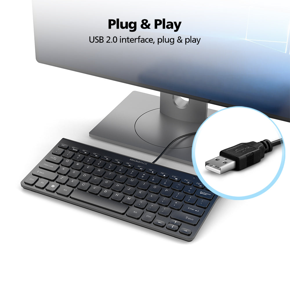 Keyboard with USB cable plugged into a monitor, emphasizing 'Plug & Play' feature.