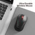 Black wireless mouse on a desk next to a laptop with 'Ultra-Durable Wireless Mouse' text.