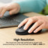 A close-up of a person's hand using a black high-resolution computer mouse on a wooden desk, with a laptop blurred in the background and text overlay reading 'High Resolution'.