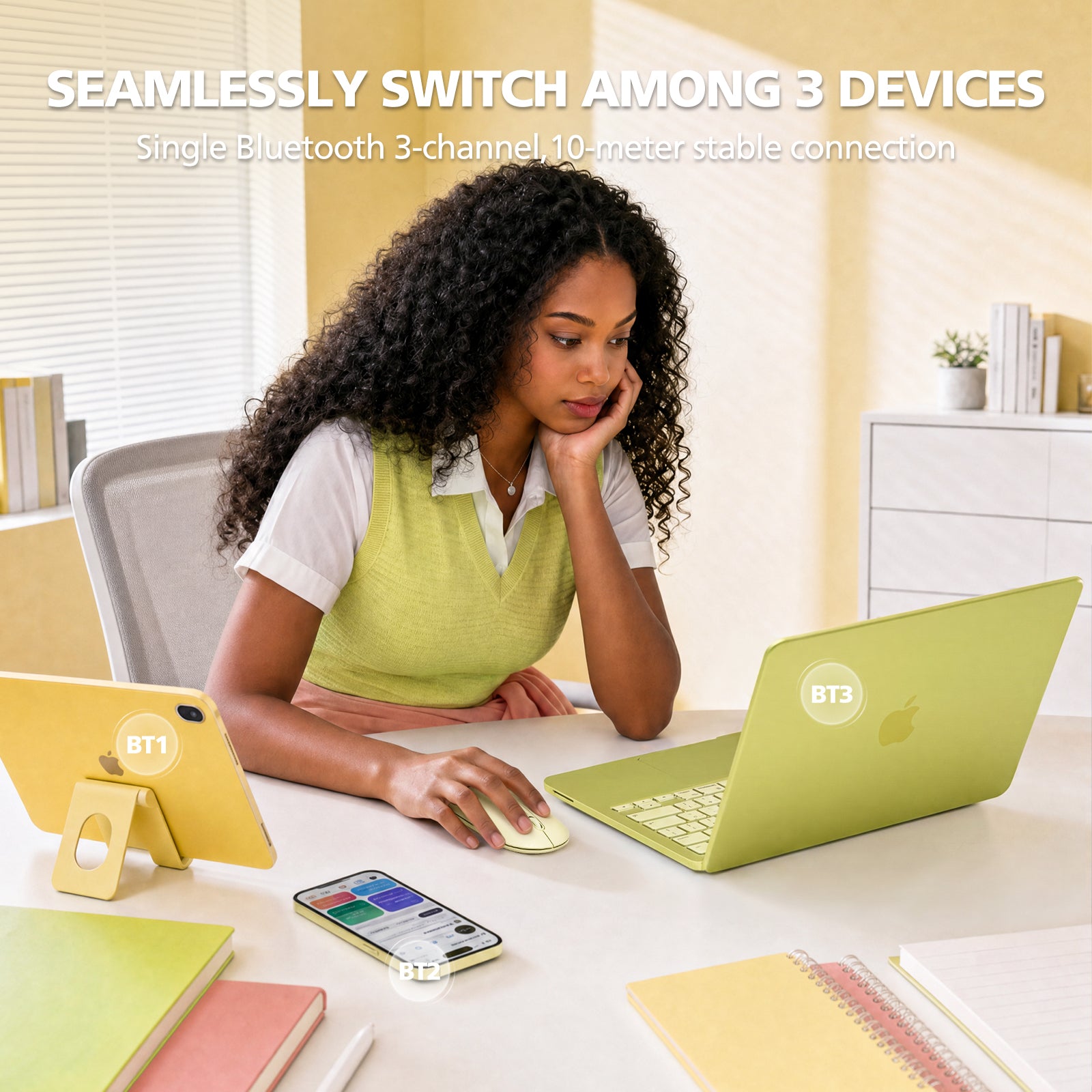 Woman using a green laptop with text about Bluetooth connectivity