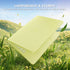 A pale yellow-green hard-shell laptop case shown open over a grassy field with flowers, with marketing text at the top reading 'LIGHTWEIGHT & STURDY' and 'Durable hard-shell protection with virtually no added weight.'.