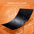 Black reusable mat with water droplets on an orange background, text indicating reusability and ease of cleaning.