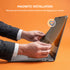Person installing a screen protector on a laptop with text about magnetic installation.