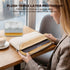 A woman at a cafe table opens a beige laptop sleeve to show its plush double-layer protection, with a coffee cup nearby and text explaining the cotton and fleece fill.