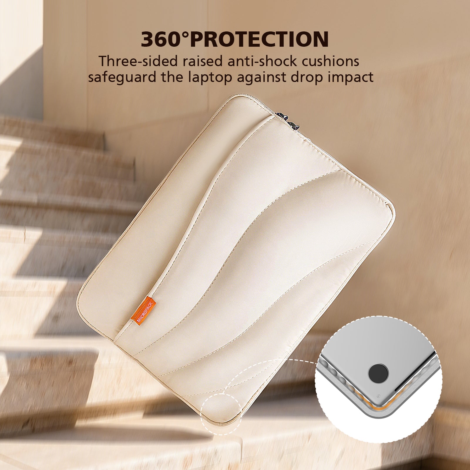 A cream-colored protective laptop sleeve with raised cushioned corners, shown on stone stairs with promotional text and a circular inset detail of the corner protection.