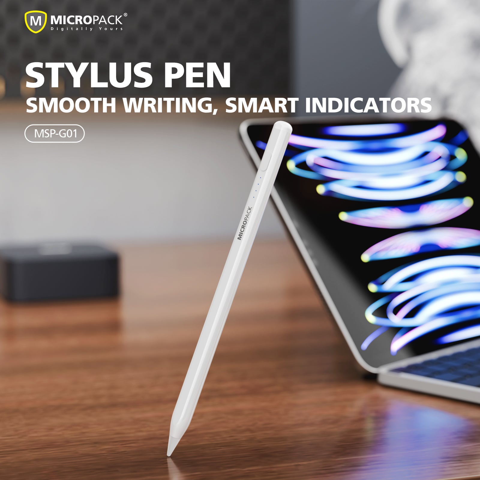 A white Micropack stylus pen standing upright on a wooden desk next to a laptop, with promotional text reading 'STYLUS PEN' and 'SMOOTH WRITING, SMART INDICATORS'.