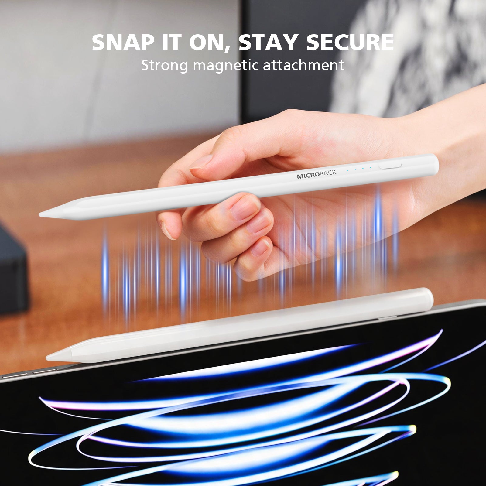 A hand holds a white stylus above a tablet, demonstrating magnetic attachment. The stylus has 'MICROSTACK' printed on it, and the image includes marketing text reading 'SNAP IT ON, STAY SECURE' and 'Strong magnetic attachment'.