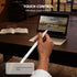 Person using a stylus with a tablet on a desk, emphasizing touch control.