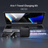 4-in-1 travel charging kit with laptop and accessories on a dark background
