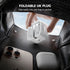 A white foldable UK wall plug is shown being inserted into a black textured bag or pocket, with a hand holding the plug. White text at the top reads 'FOLDABLE UK PLUG' and 'Slips easily into any bag or pocket.
