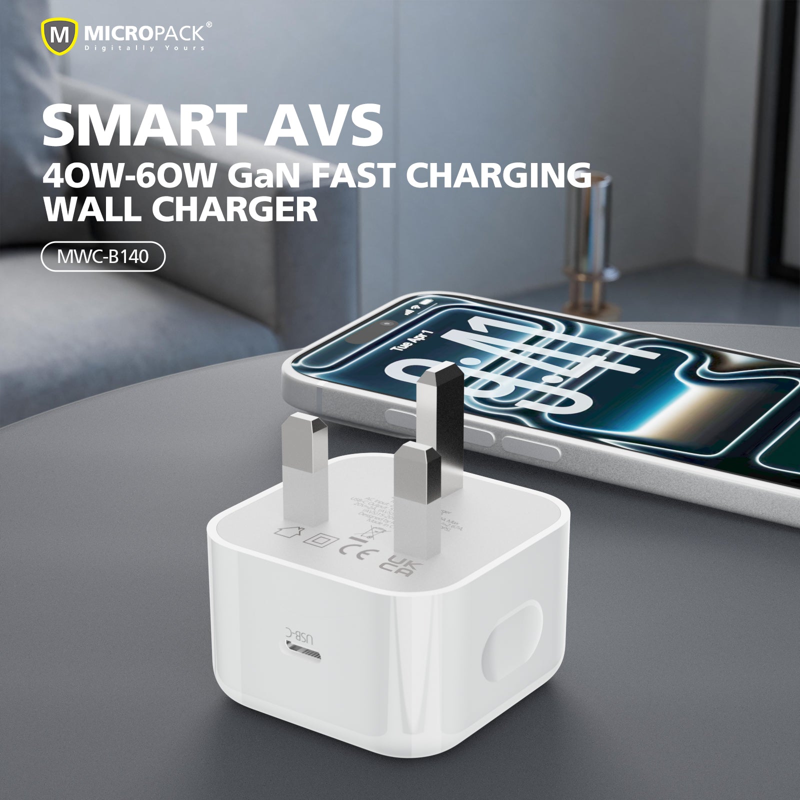 White Micropack Smart AVS 40W-60W GaN fast charging wall charger shown in a modern room setting next to a smartphone.