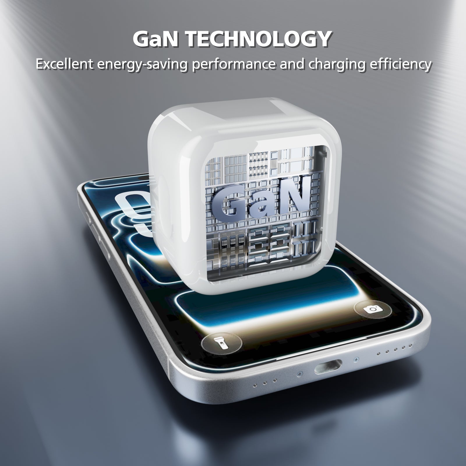 A smartphone lying on a reflective gray surface with a white cube-shaped GaN technology badge floating above it. The badge has a transparent front showing a metallic GaN structure and the text 'GaN TECHNOLOGY' with a subtitle about energy-saving performance and charging efficiency.